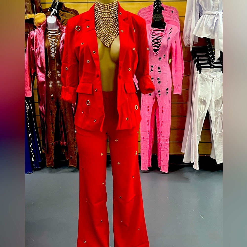 Body hugging blazer all over-eyelet design Matching pant elastic waist wide leg